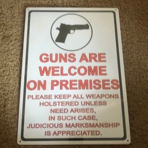 Tin sign- Guns Welcome